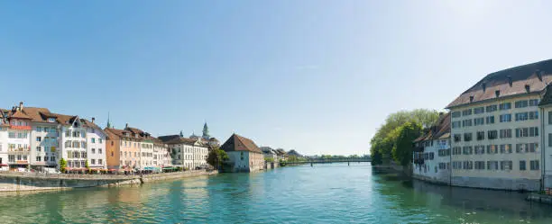 Solothurn, SO / Switzerland - 2 June 2019: city of Solothurn with the river Aare and a panorama cityscape view of the old town