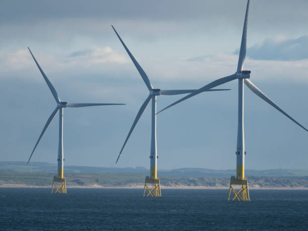 Offshore wind turbines near Aberdeen, Scotland Part of the offshore wind farm in Aberdeen bay, Scotland offshore wind farm stock pictures, royalty-free photos & images