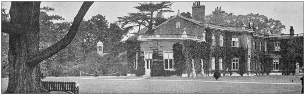 istock Antique vintage black and white photo: British countryside house 1155702435