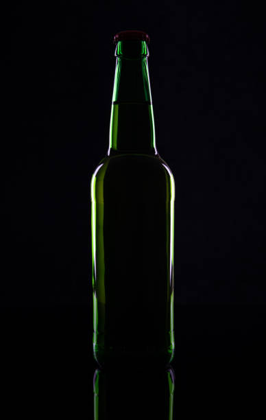 Improvised decorative hanging element over a bar counter made from empty green beer bottles