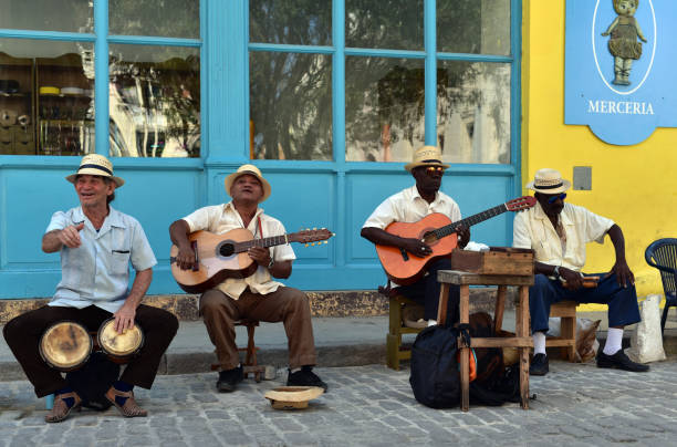 Cuban street musicians Cuban street musicians play and sing in the streets of Havana Vieja in Havana, Cuba salsa music photos stock pictures, royalty-free photos & images