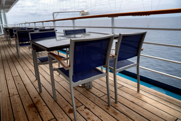 istock Table and Chairs at a Dining Area on a Cruise Ship 1155712144