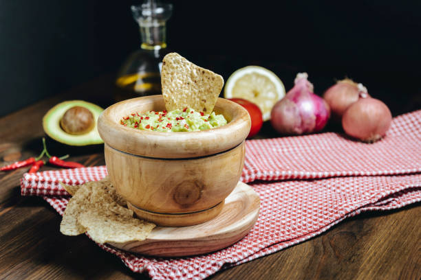 istock guacamole surrounded by fresh ingredients 1155713181