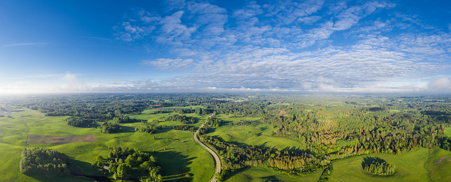 Road section Vecpiebalga - Jaunpiebalga at sunrise taken from an airborne drone flying at 120m height