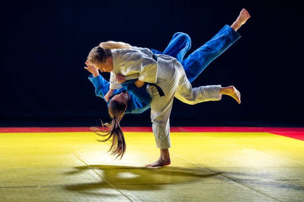 istock Two female judokas sparring 1155720800