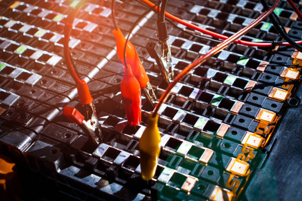 close up of a plotted circuit layout in red and blue for a printed board