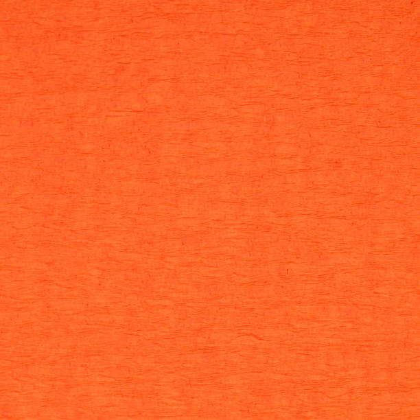 istock background from dark orange color corrugated paper 1155733259