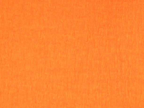 istock background from orange color corrugated paper 1155733269