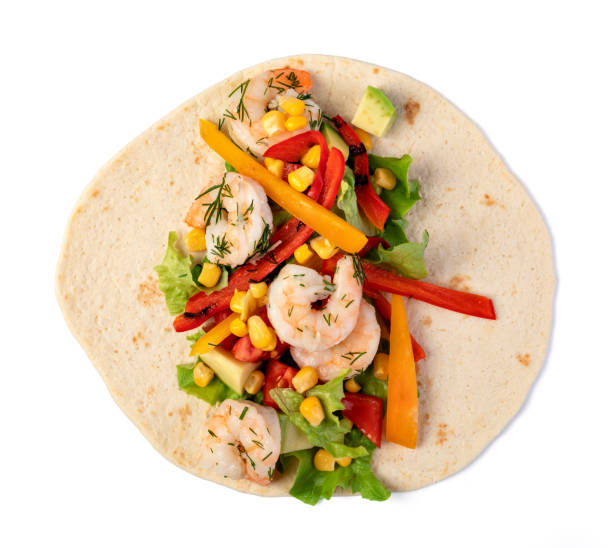 istock burrito with vegetables and tortilla 1155736313