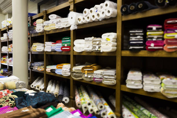 istock different fabric bolts exposed on shelves 1155736414