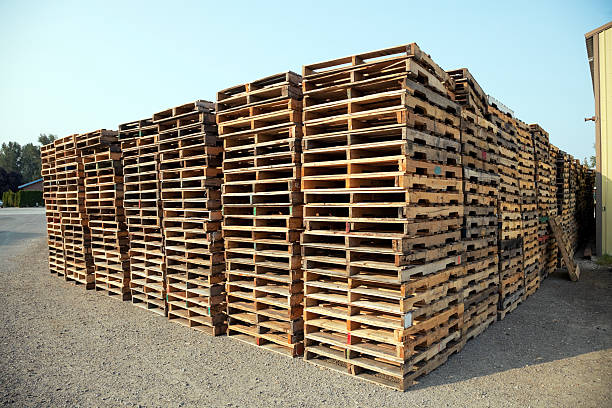 Stack of wooden pallets stock photo