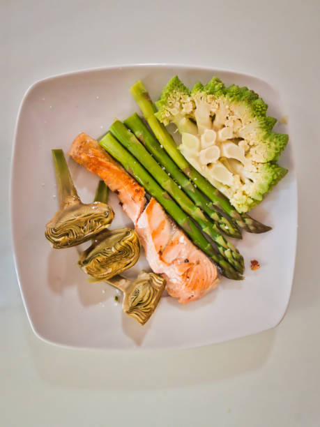 istock Tasty and healthy salmon dish with vegetables 1155737839