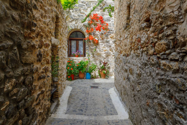 istock Alley in Mesta, Chios Island, Greece 1155738757
