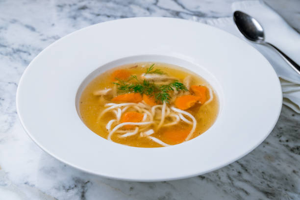 istock Chicken soup bouillon in a plate 1155739139