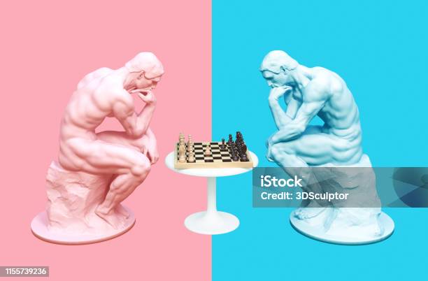 Two Thinkers Pondering The Chess Game On Pink And Blue Backgrounds Stock Photo - Download Image Now
