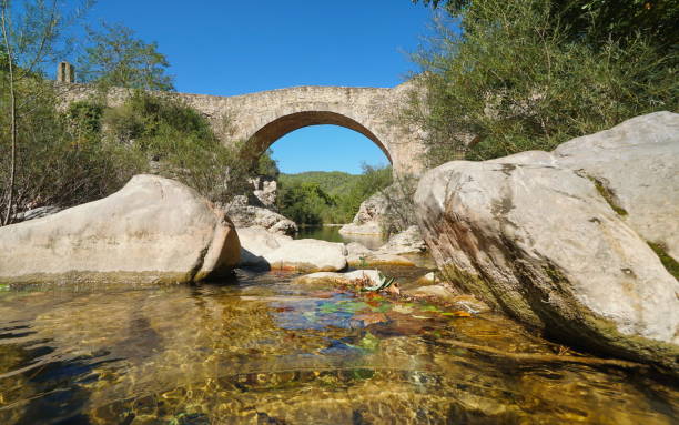 istock Medieval bridge over the river Spain Catalonia 1155741449