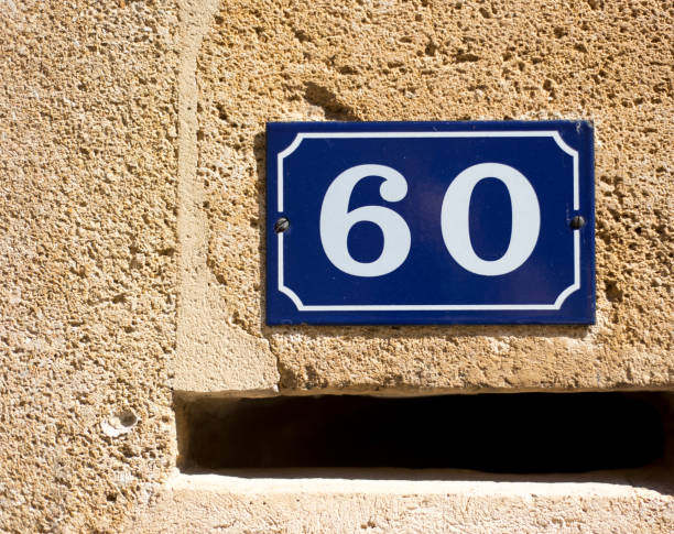 istock France: Number 60 Street Address Plaque (Close-Up) 1155741525