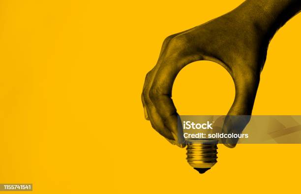 Light Bulb In Hand Stock Photo - Download Image Now - Innovation, Creativity, Inspiration