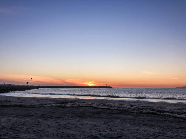 istock Winter sunset over the Pacific Ocean in Los Angeles, CA 1155743776