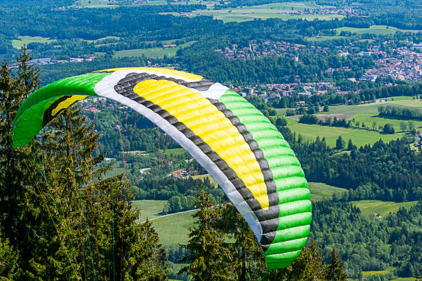 istock A paraglider is in the Alps 1155743820