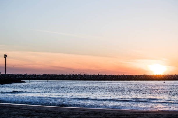 istock Winter sunset over the Pacific Ocean in Los Angeles, CA 1155743832