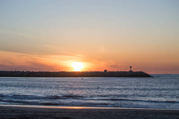 istock Winter sunset over the Pacific Ocean in Los Angeles, CA 1155743842