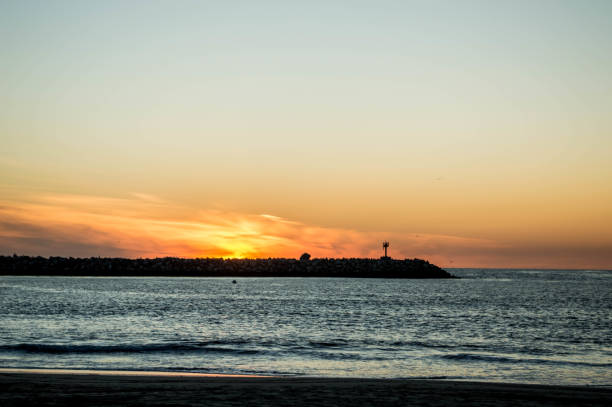 istock Winter sunset over the Pacific Ocean in Los Angeles, CA 1155743861