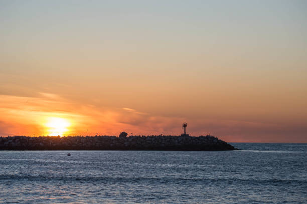 istock Winter sunset over the Pacific Ocean in Los Angeles, CA 1155743868