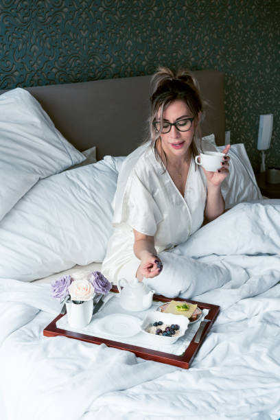 istock woman enjoying at home 1155749698