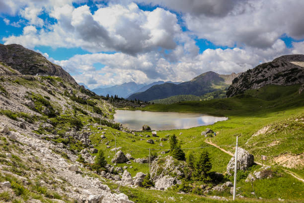 istock Alpine lake panorama in dolomites 1155751975