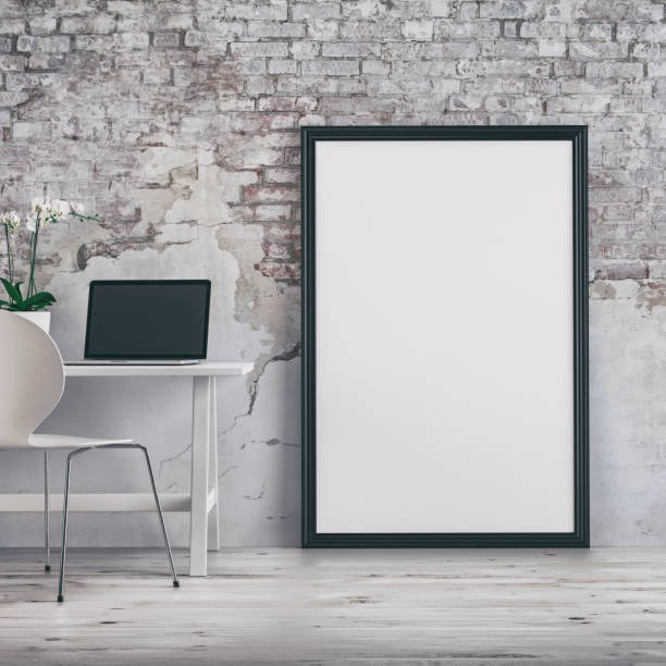 istock Workdesk with decoration, picture frame and copy space -ruined wall 1155756529