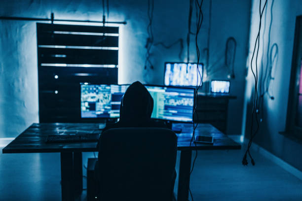 istock Hacker stealing money from credit cards 1155760985