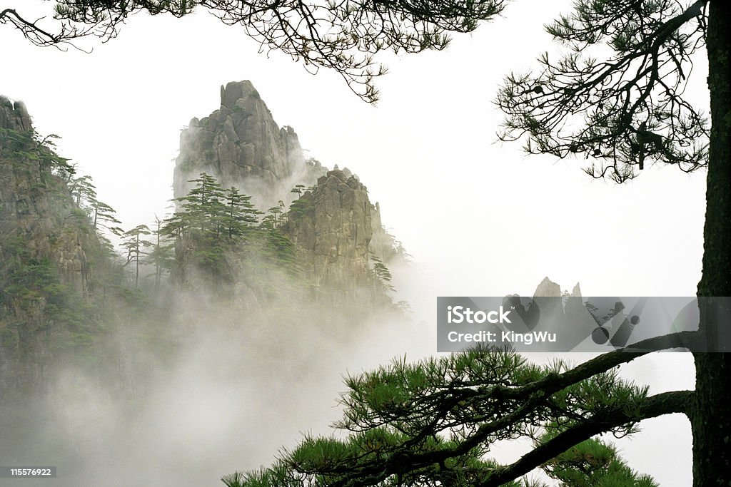 Beauty in Nature Mist rising in Huangshan national Park, Anhui Province, China. Huangshan Mountain Range - Anhui Province - China Stock Photo