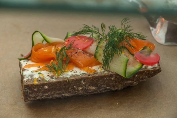 istock Smoked salmon bagels with cream cheese and cucumber. 1155772683