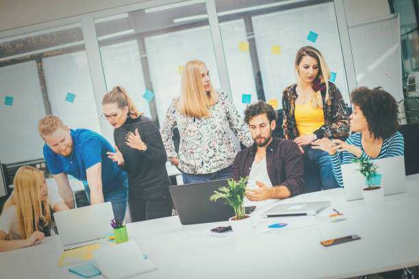 istock Business people working in modern office space 1155775674