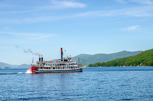 Cruise Steamboat (Minne Ha Ha) on Lake George (NY) during day of springtime