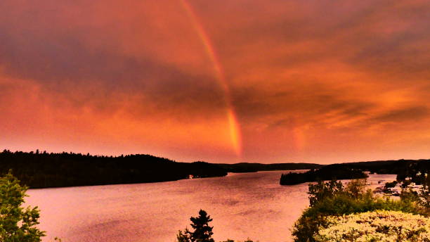 istock Spectacular sunrise with a rainbow 1155803159