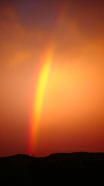 istock Spectacular sunrise with a rainbow 1155803184