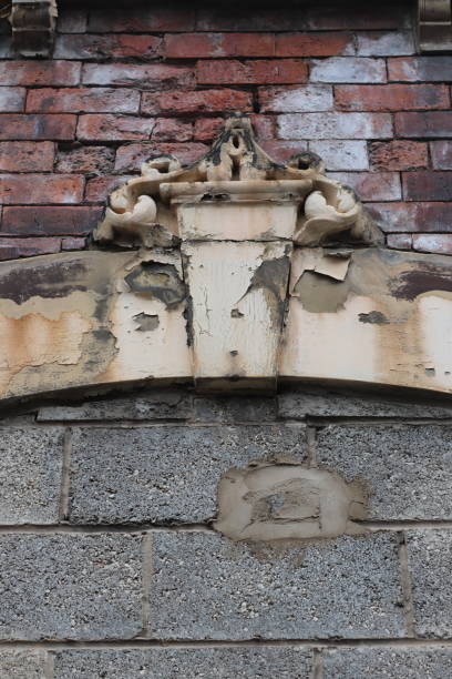 istock Architectural details of an abandoned building 1155808904
