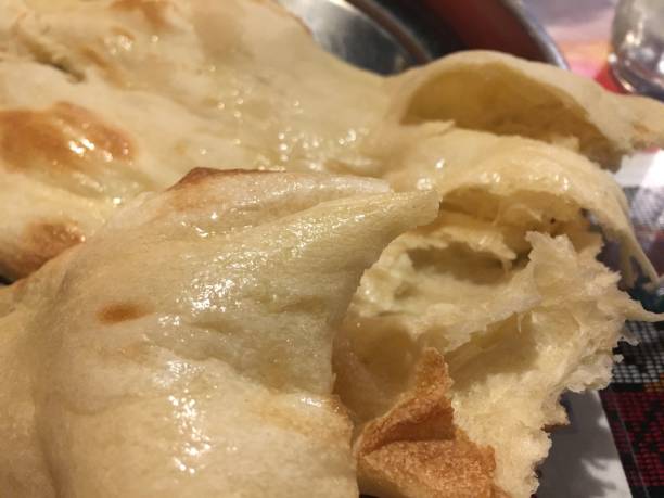 istock India and nepal style bread called NAAN 1155812433