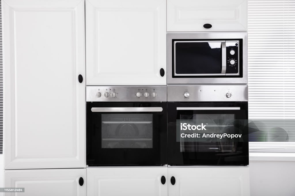https://media.istockphoto.com/id/1155812484/photo/small-electric-oven-in-the-cabinet.jpg?s=1024x1024&w=is&k=20&c=FFc-OY--TQ2faGoEf7-3pV0Qm8qv2LHavOn-sYoGQ2g=