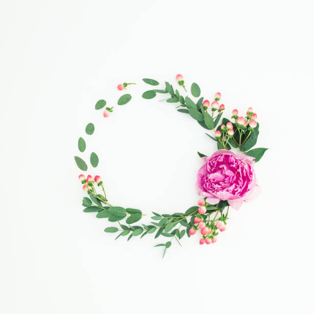 istock Found frame made of pink peony flower, hypericum and eucalyptus on white background. Flat lay, top view 1155814181