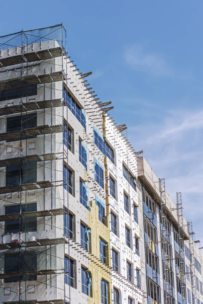 istock construction site of modern building with scaffolding on its facade 1155814878