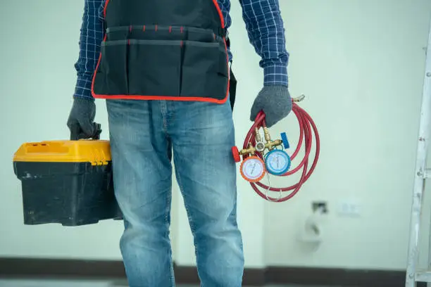 Photo of The technician is checking the air system.