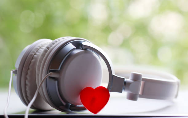 istock White elegance headfones and red heart 1155821789