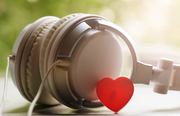 istock White elegance headfones and red heart 1155821843