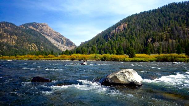 istock Scenic Riverside View From the Madison RIver in Autumn 1155828453