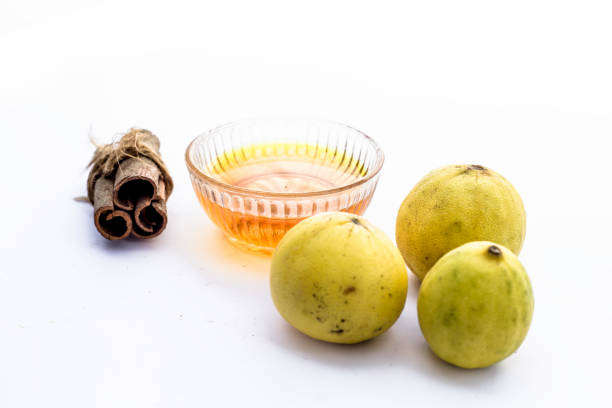 istock Cinnamon face pack isolated on white i.e. Cinnamon powder well mixed with lemon and honey and removes dark spots, eliminates scars, and moisturizes your skin.Entire raw ingredients present. 1155830951
