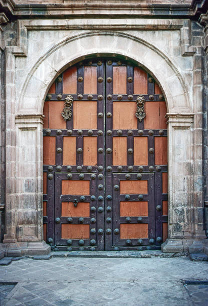 istock Old vintage door on Cathedral, Cusco 1155834758