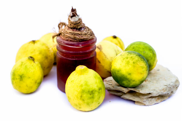 istock Lemon face mask isolated on white i.e. Lemon juice well mixed with fuller's earth along with the help of some rose water.Entire raw ingredients present on the surface. 1155834920